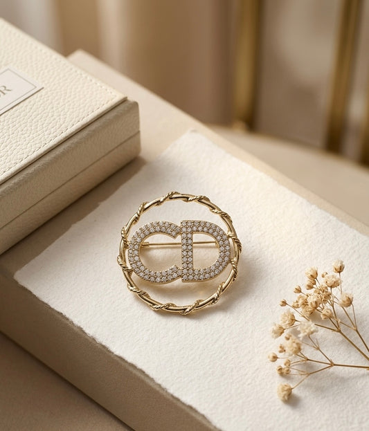 CD Brooch